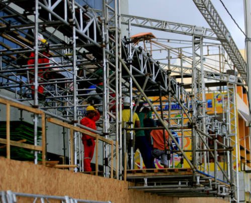 salvador, bahia / brazil - february 21, 2014: workers are seen during assembly of metal structure for cabins at the carnival in the city of Salvador."n
