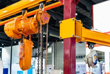 Manual chain hoist and overhead electric chain hoist install at mono rail runway beam